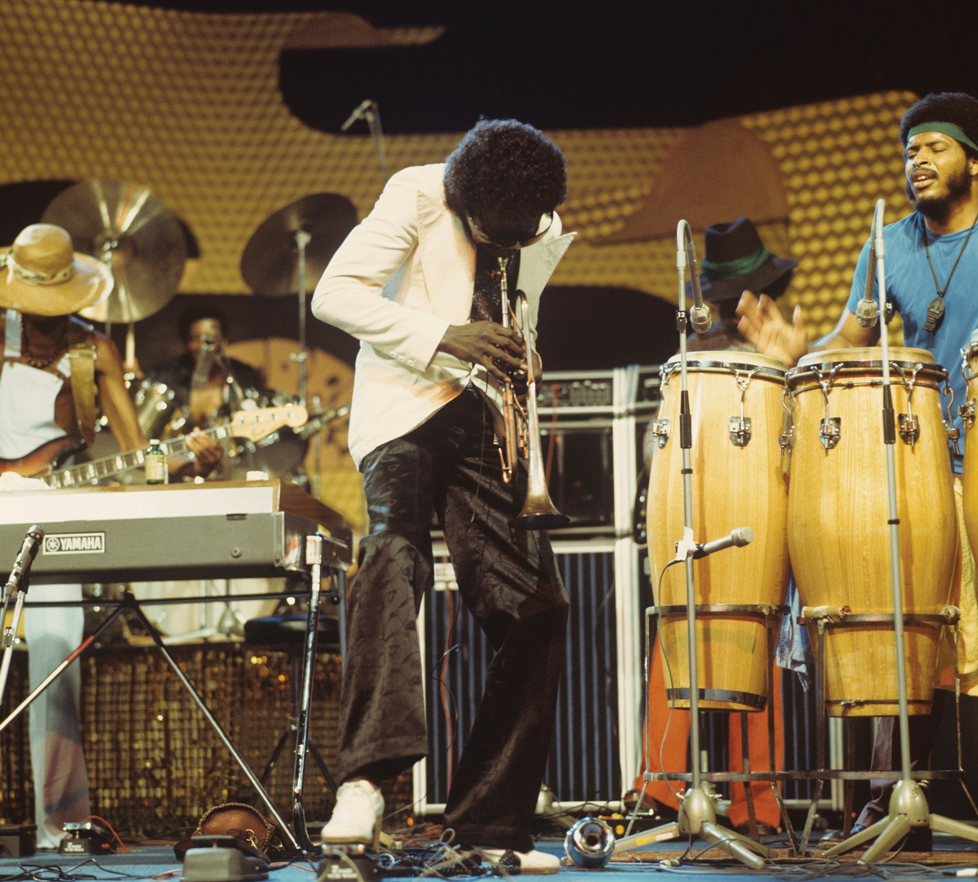 Bassist Michael Henderson, Miles Davis, and James Mtume perform at the Montreux Jazz Festival, Switzerland, July 08, 1973. Photo by David Warner Ellis via Redferns/Getty.